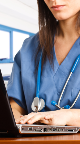 Nurse Using Laptop Nurse Using Laptop